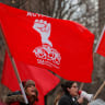 Demonstrators with the Democratic Socialists of America take part in a rally on International Women’s Day in Manhattan in New York City, New York, U.S., March 8, 2018.