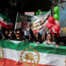 Iranians living in Greece chant slogans during a rally, marking the Global Day of Action for Iran, to support Iran's Lion and Sun Revolution, in Athens, Greece, February 14, 2026