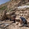 Workers and volunteers on an archaeological dig sift through dirt at Alexandrion/Sartaba in the Jordan Valley.