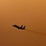 An Israeli Air Force fighter jet flies over central Israel amid the ongoing war between Israel, Iran and Hezbollah, March 12, 2026.