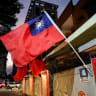 Taiwanese flags are installed along a street, in New Taipei city, Taiwan December 9, 2024.