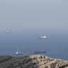 Ships and tankers in the Strait of Hormuz off the coast of Musandam, Oman, April 18, 2026.