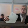 A Palestinian woman is seen voting in local elections, in Gaza. 