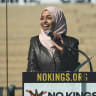 US Rep. Ilhan Omar (D-MN) speaks behind a glass during a "No Kings" protest against U.S. President Donald Trump's administration policies, in St. Paul, Minnesota, March 28, 2026.
