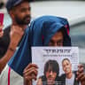 Protesters gather outside a court in Petah Tikva, holding signs and calling for justice following the killing of Yemanu Binyamin Zalka, a Pizza Hut employee who was stabbed and later died of his wounds on the eve of Independence Day, May 5, 2026.