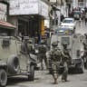 Israeli security forces operate during a raid in the West Bank city of Nablus, May 3, 2026.