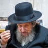 Rabbi Dov Lando, head of the Slabodka yeshiva in Bnei Brak arrives to deliver a lesson at the Mir Yeshiva, in the ultra orthodox neighborhood of Mea Shearim, Jerusalem, September 19, 2023.