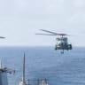 An MH-60R Sea Hawk helicopter approaches USS Delbert D. Black (DDG 119) after patrolling the Arabian Sea in support of the US blockade against Iran, May 27, 2026.
