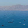 A drone view shows vessels anchored at the Strait of Hormuz, as seen from Musandam, Oman, May 25, 2026.