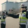 The robots that direct traffic and answer questions on the street