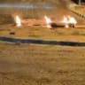 Debris burns in a Kuwait parking lot following Iranian missile, drone attacks, June 3, 2026. (Illustrative)