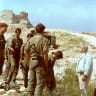 Then-defense minister Ariel Sharon (R) meets with IDF soldiers after a battle with Palestinian gunmen at Beaufort Castle, southern Lebanon, June 7, 1982.