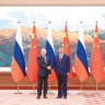 Russian President Vladimir Putin and Chinese President Xi Jinping pose at Beijing’s Great Hall of the People, May 20.