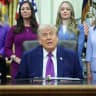 US President Donald Trump, joined by lawmakers and healthcare industry professionals, answers a reporters question during an event on maternal healthcare in the Oval Office of the White House on May 11, 2026 in Washington, DC.
