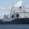 he U.S. Navy amphibious transport dock ship USS John P. Murtha sails through San Diego Bay en route to Naval Base San Diego with the Artemis II mission Orion spacecraft onboard on April 11, 2026 in San Diego, California.