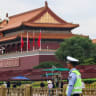 A police officer guards next to the Tiananmen Gate in Beijing, China, June 4, 2026. 