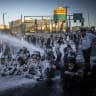 Ultra orthoodx jewish men block a road and clash with police during a protest against the jailing of yeshiva students who failed to comply with an army recruitment order, in Jerusalem, June 1, 2026.