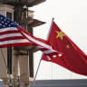 U.S. and China’s national flags flutter in Tiananmen Square, ahead of U.S. President Donald Trump's visit to China, in Beijing, China, May 13, 2026. 