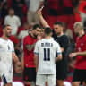 ISRAEL STRIKER Oscar Gloukh and Albania's Elseid Hysaj are shown a yellow card by referee Milija Savovic after an altercation stemming from the booing of Hatikvah before Israel's 1-0 friendly victory over host Albania in Tirana.