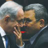 Prime Minister Benjamin Netanyahu speaks to then-defense minister Ehud Barak during a session at the Knesset in 2009.
