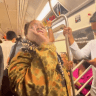A SCREENSHOT from a video showing a woman shouting and attacking a Jewish woman on the New York subway.
