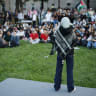 Attendees gather for a vigil organized by the Students for Justice in Palestine along McKeldin Mall in the heart of the University of Maryland campus on October 07, 2024 in College Park, Maryland. 