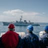 Romanian soldiers practise an approach with a Bulgarian ship during the Sea Shield 25 multinational military exercise on board the frigate "Regina Maria" on April 8, 2025 in the Black Sea.