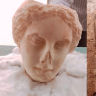 Marble head belonging to a statue of the Greek goddess Aphrodite and an ancient Egyptian cartouche discovered at Egypt's Heracleopolis, June 5, 2026.