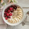 Yogurt with bananas, oats, cranberries, and raspberries