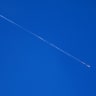 Ballistic missiles launched from Iran, as seen over the West Bank city of Hebron, June 8, 2026. 