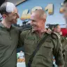Col. Meir Biderman (L), wounded by a Hezbollah drone attack, embraces IDF Northern Command Chief Maj.-Gen. Rafi Milo (R) at a changeover ceremony, June 7, 2026.
