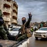 Syrian Public Security Forces drive along a street as they enter the Kurdish-majority city of Qamishli in northeastern Syria on February 3, 2026, under an integration deal with Kurdish authorities. 