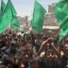 Palestinians carry the bodies of Imad Salim, also known as Abu Hassan, a senior commander in Hamas' armed wing, the Al-Qassam Brigades, and others during their funeral procession in Gaza City on May 28, 2026. 