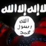 A man types on a keyboard in front of a computer screen on which an Islamic State flag is displayed, in this picture illustration taken in Zenica, Bosnia and Herzegovina, February 6, 2016.