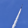 This picture taken from a position in the Upper Galilee region in northern Israel shows an Israeli Iron Dome missile streaking accross the sky to intercept incoming projectiles on May 31, 2026.