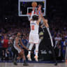 New York Knicks guard Jalen Brunson (11) shoots against San Antonio Spurs forward Victor Wembanyama (1) in the fourth quarter during game four of the 2026 NBA Finals at Madison Square Garden.