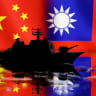 A Navy miniature is seen in front of displayed Chinese and Taiwanese flags in this illustration taken, April 11, 2023.
