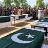 Pakistani Army officers and people offer prayers as they attend the funeral of the victims, who died after an Mi-17 helicopter of Pakistan Army Aviation crashed near Muzaffarabad on Wednesday during take-off, in Muzaffarabad, Pakistani Kashmir, June 11, 2026.