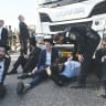 Haredim block a road and clash with police to protest the jailing of seminary students who fail to comply with IDF recruitment orders, June 1.