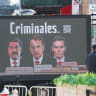 A VEHICLE with an electronic board displays the word ‘criminals’ over images of ousted Venezuelan president Nicolás Maduro (right), former Spanish prime minister José Luis Rodriguez Zapatero (middle), and Spanish Prime Minister Pedro Sánchez (right) in New York City in March.