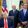 US President Donald Trump listens to an attendee in the Oval Office at the White House in Washington, DC, US, June 11, 2026. 