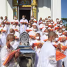Officials pay their respects to Thailand's Princess Bajrakitiyabha during hospitalization after a heart problem, during a mass Buddhist novice monk ordination ceremony at Sukanthawat temple in Samut Prakan, Thailand, December 20, 2022. 