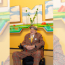 Artist David Hockney poses in front of his work during the "Do You Remember They Can't Cancel The Spring - David Hockney 25" Exhibition at Louis Vuitton Foundation on April 7, 2025 in Paris, France.