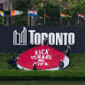  FBL-WC-2026-PRTOEST Activists place a banner covering the logo of the FIFA World Cup 2026 with the words "Kick Israel out of FIFA" in Toronto, Canada, June 12, 2026, on the day of the first game of the Canadian team in the World Cup against Bosnia-Herzegovina. 