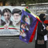 People from Tehran province gather in support and allegiance to Iranian Supreme Leader Mojtaba Khamenei, while holding Iranian flags and images of both the new and former leaders of Iran, on June 12, 2026 at Palestine Square in Tehran, Iran.