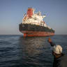 Ships are anchored in the Strait of Hormuz, May 16. Shipping through Hormuz has still not returned to normal. 