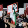 People take part in a protest ahead of an expected signing of an agreement to end the U.S.-Iran conflict, according to U.S. and Pakistani leaders, in Tehran, Iran, in this still image obtained from a social media video released on June 13, 2026.
