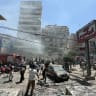 People gather at the site of an Israeli airstrike that targeted a building in Beirut's southern suburbs on June 14, 2026. 