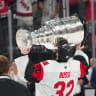 Carolina Hurricanes goaltender Brandon Bussi (32) raises the the Stanley Cup after defeating the Vegas Golden Knights in game six of the 2026 Stanley Cup Final at T-Mobile Arena, June 14, 2026.