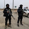 Security forces of Syria's Interior Ministry guard the al-Omar oil field, Syria's largest by area and production, near the Euphrates River east of al-Shuhail and approximately 10 kilometers east of al-Mayadin in Deir ez-Zor Governorate on January 22, 2026 in Deir ez-Zor, Syria. 